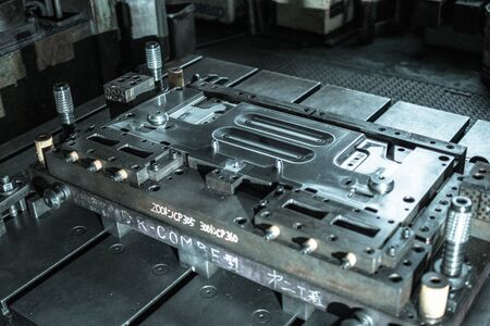 Sheet Metal Stamping Tool Die for Automotive Precision Parts on the Numeric Control Milling Machine Table. Tandem Stamping System. At a High Quality Technology Factory.の写真素材