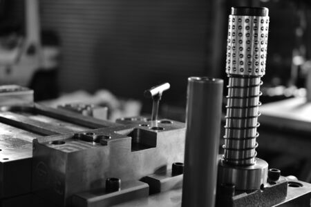 Sheet Metal Stamping Tool Die for Automotive Precision Parts on the Numeric Control Milling Machine Table. Tandem Stamping System. At a High Quality Technology Factory.Â Black and White Photography.の写真素材
