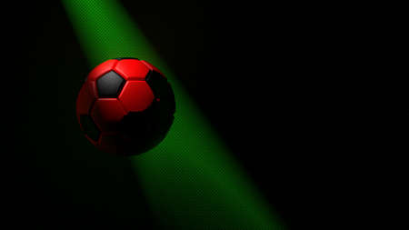 Black-Red Soccer ball on the green metallic painted wall under slit light. 3D illustration. 3D CG. 3D high quality rendering.の写真素材