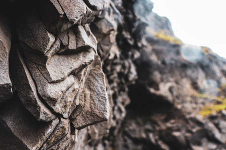 Basalt rock formations on the black sand beaches of Reynisfjara, near Vik, Iceland.の写真素材