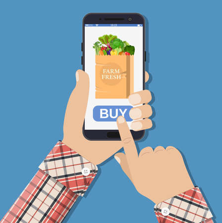 Hand holding smartphone with shopping bag full with different healthy food. Grocery delivery. Internet order. Online supermaket. Vector illustration in flat styleのイラスト素材