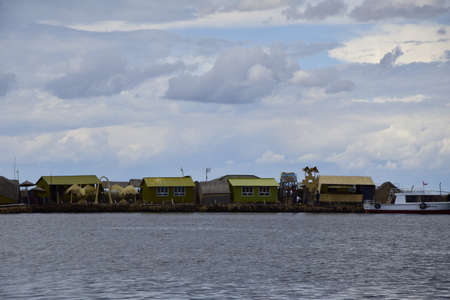 Titicaca lake, Puno, Peru. Uros floating islands on Titicaca lake in Puno, Peru, South America.の写真素材