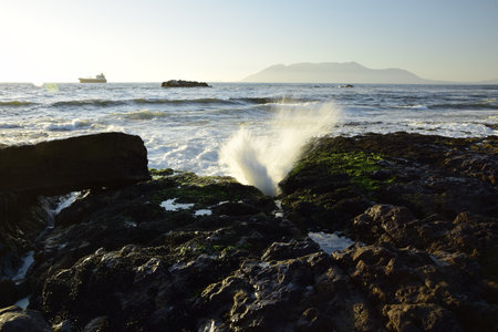 Ocean waves wash over rocky coasts. Antofagasta, Chile