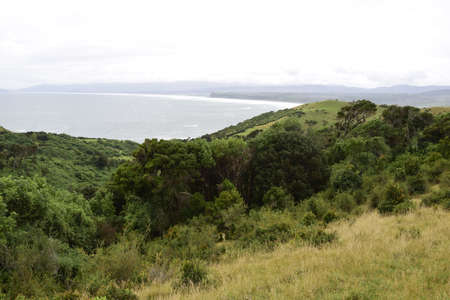 The landscape of the ocean and the rocky coast in Cucao on the way to Muelle de las Almas (Dock of...