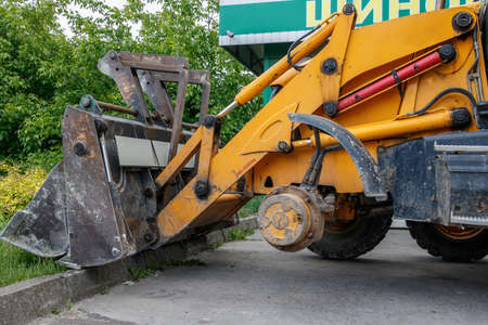 excavator change wheel at tire service without front wheel