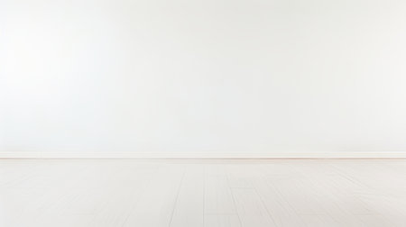 This photo captures a clean and minimalist room with a white wall and floor, providing a spacious and versatile environment.の素材