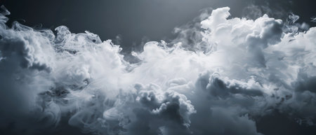A thick, swirling mass of white smoke fills the bottom half of the image, with a dark gray sky above. The smoke is illuminated from the upper right, casting shadows that accentuate its texture.の素材