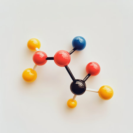 A colorful molecular model representing a chemical compound is displayed on a white surface showcasing different atoms in vibrant colors.の素材