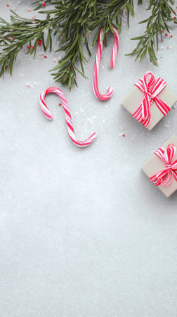 Colorful candy canes and beautifully wrapped gifts create a cheerful atmosphere for New Year festivities inviting warmth and excitement.の素材