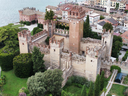 Lazise, VE, Italy - 08, 19, 2024. Aerial shot of the historic Lazise Castle by Lake Gardaのeditorial素材
