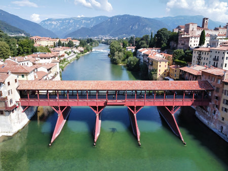Bassano del Grappa, VI, Italy - 08, 15, 2024. Aerial shot of Ponte degli Alpini and Brenta River in Bassano del Grappaのeditorial素材