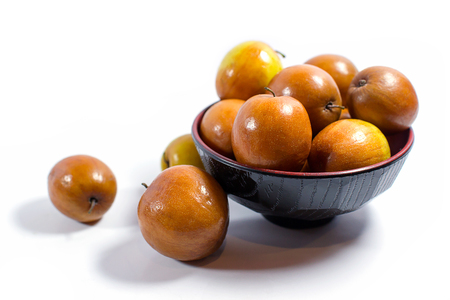 Jujube fruits close up on white background.の写真素材