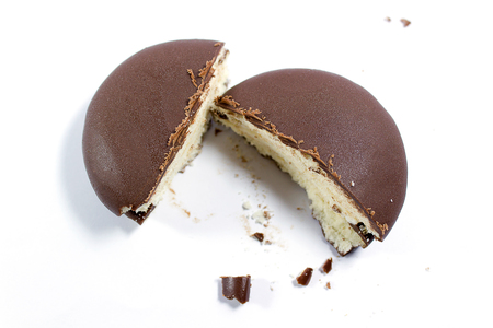 close up of a chocolate cream pie on white background.の写真素材