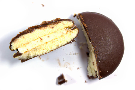 close up of a chocolate cream pie on white background.の写真素材