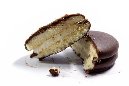 close up of a chocolate cream pie on white background.の写真素材