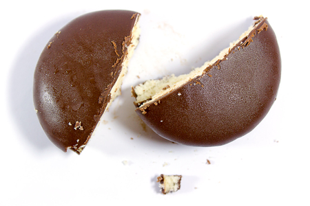 close up of a chocolate cream pie on white background.の写真素材