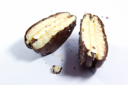 close up of a chocolate cream pie on white background.の写真素材