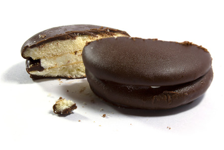 close up of a chocolate cream pie on white background.の写真素材