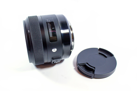 Close up of camera lens on a white backgroundの写真素材