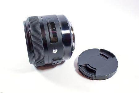 Close up of camera lens on a white backgroundの写真素材