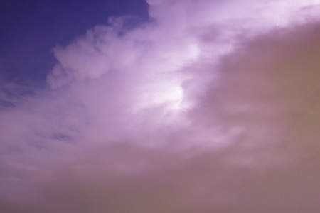 Dark sky and cloud storm with lightning before rain.の写真素材