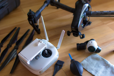Cleaning professional camera drone with accessories after fly.の写真素材
