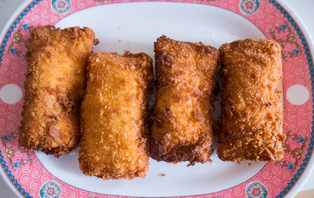 Fried bread of snack ready to eat on plate.の写真素材