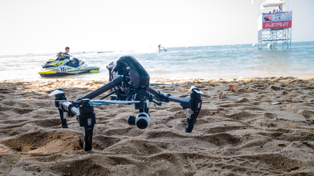 On Dec 10,2017. Professional camera drone on beach with jet ski in Jet ski world cup 2017 at Jomtien Beach in Chon Buri, Thailand.のeditorial素材