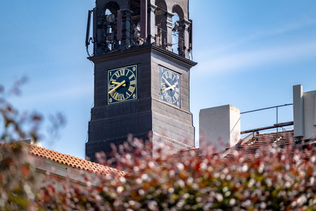 Clock tower of the Church of Our Lady of the Immaculate Conception in Prague, Czech Republicの写真素材