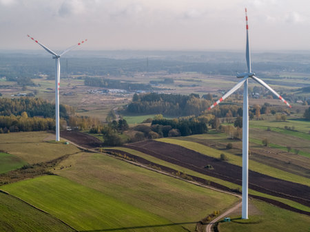 Aerial view of wind turbines in the field Poland, Renewable energy, Clean renewable green wind power, Classic energy conceptの写真素材