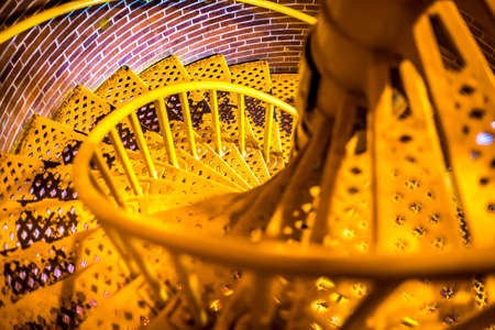 Spiral stairs that lead the way to the top of the lighthouse. Upper view.の写真素材