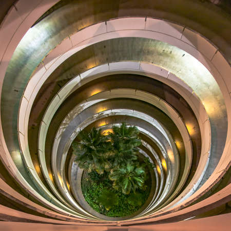 San Diego downtown parking garage with trees in centerの写真素材