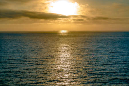 Dramatic sunset off the coast of San Diego. The coast of California near the Scripps pierの写真素材