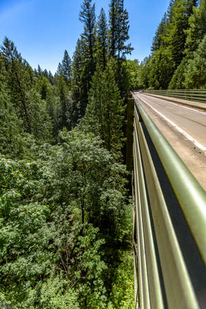Iron bridge in Washington near Mount Rainier. Hiking and traveling views near Mount Rainier in Washington over the summerの写真素材