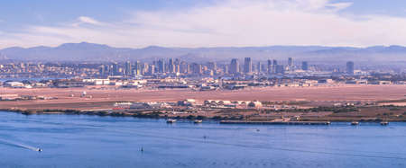 Downtown San Diego cityscape and the bay with boats. San Diego Bay shot from Cabrillo park.の写真素材