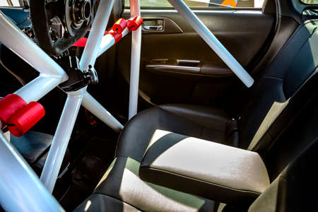 Racing car interior with dramatic lighting. Various vehicle details in Southern California.の写真素材