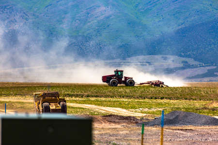 Tractor working in Eagle Mountain, Utahの写真素材