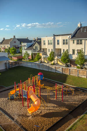 Colorful playground near townhomes