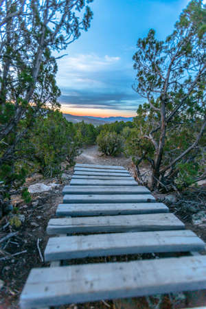 Wooden structure at sunset on trail
