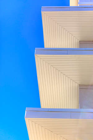 White details of building with blue sky