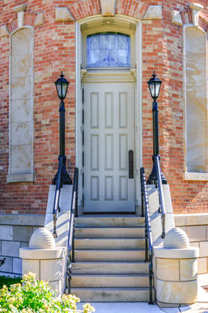 Tall door with stairs leading up