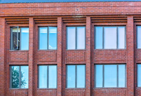 Park City apartments with teal reflective windowsの写真素材