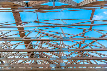 Roof beams of a new wooden constructionの写真素材