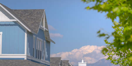 Upper floor of a house view against a blue sky