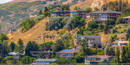 Salt Lake City homes on the slope of grassy hills