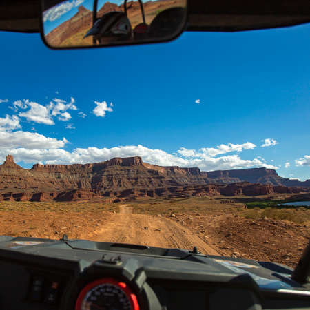 Moab trail and cayon seen from inside a vehicleの写真素材