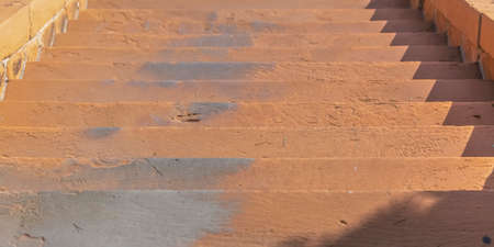 Close up of outdoor cement stairs on a sunny dayの写真素材