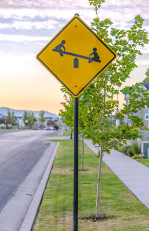 Playground sign on a sunny street in Daybreak Utahの写真素材