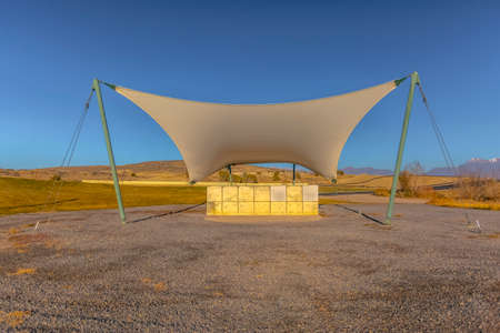 Large amphitheatre with gravel in front of stage