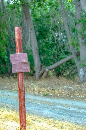Directional sign and a hiking trail in Provo Utahの写真素材